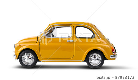 Yellow retro toy car isolated on white 87923172