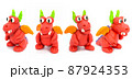 Play plasticine Dragon on white background. Handmade clay plasticine 87924353