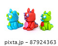 Play plasticine Dragon on white background. Handmade clay plasticine 87924363