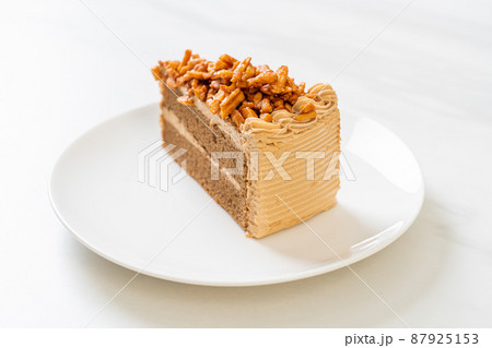 coffee almonds cake on plate 87925153
