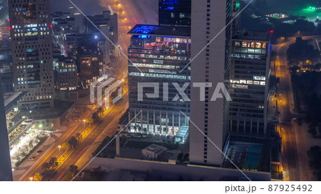 Office skyscrapers in financial district aerial night to day timelapse 87925492