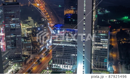 Office skyscrapers in financial district aerial all night timelapse Office skyscrapers in financial district aerial all night timelapse 87925496