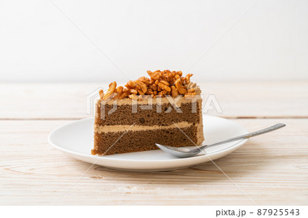 coffee almonds cake on plate 87925543