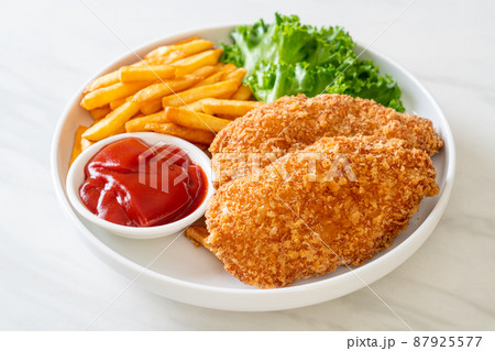 fried chicken breast fillet steak with french fries 87925577