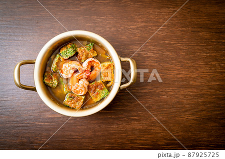 Sour soup made of Tamarind Paste with Shrimps and Vegetable Omelet Sour soup made of Tamarind Paste with Shrimps and Vegetable Omelet 87925725