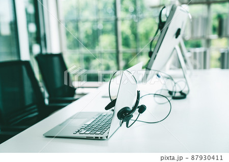 Headset and customer support equipment at call center ready for actively service Headset and customer support equipment at call center ready for actively service 87930411