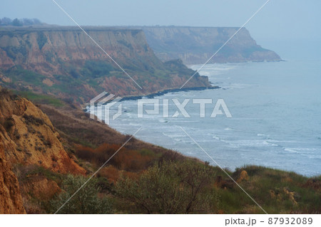 seascape in the evening - sea, waves, horizon and haze, view from high hills 87932089