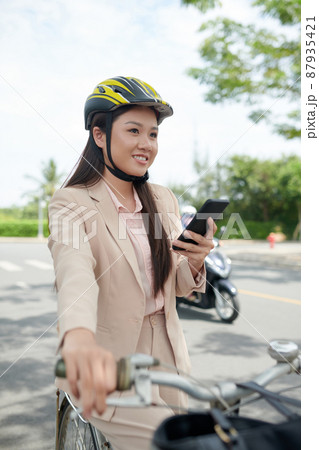 Businesswoman Riding to Work 87935421