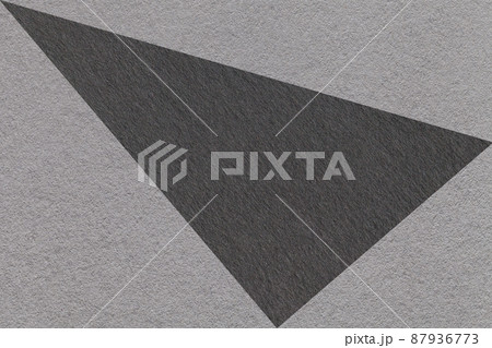 Texture of craft gray and black colors paper background, macro. Structure of cardboard with geometric pattern. 87936773