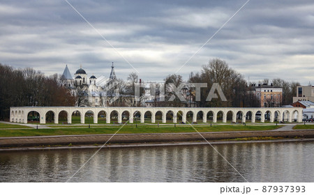 Old Russian architecture of Yaroslav's courtyard in the autumn in Veliky Novgorod. 87937393