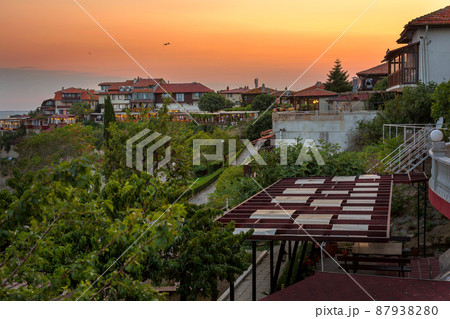 Pomorie, Bulgaria coastline, houses at sunset 87938280