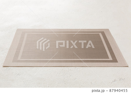 Perspective view of brown tablecloth for food on cement background. Empty space for your design 87940455