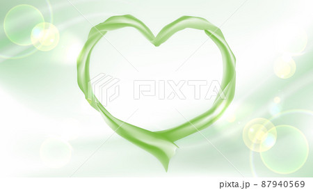 柔らかいグリーンの布、ハート型の輪、抽象的な流線形の背景画像 87940569