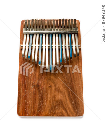 Traditional wooden kalimba isolated on white Traditional wooden kalimba isolated on white 87943340