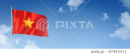Vietnamese flag isolated on a blue sky. Horizontal banner Vietnamese flag isolated on a blue sky. Horizontal banner 87943411