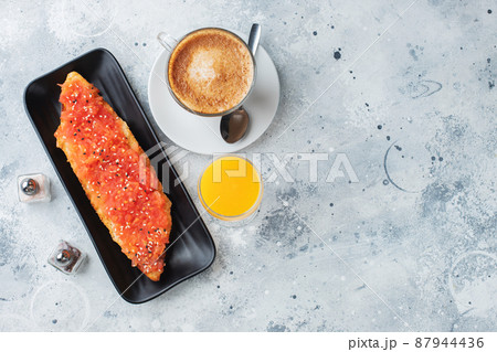 Traditional Spanish breakfast. Tostada with different toppings on a light background. Top view with copy space 87944436