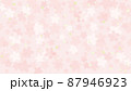 明るい桜の花びらと葉っぱの背景 87946923