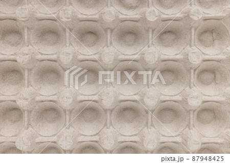 Cardboard for 30 pack of large eggs. Closeup, abstract background Cardboard for 30 pack of large eggs. Closeup, abstract background 87948425