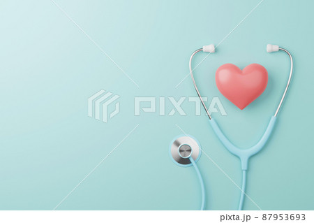 Top view of medical stethoscope and heart on cyan background 87953693