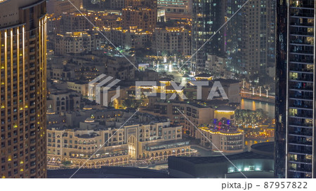 Aerial view to traditional houses of old town island night timelapse from above. Aerial view to traditional houses of old town island night timelapse from above. 87957822