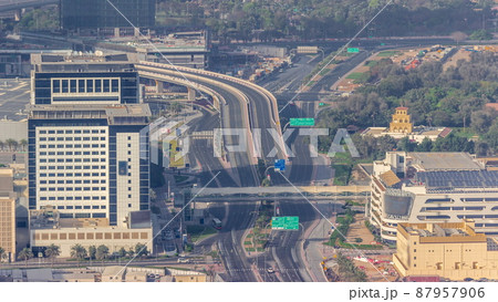 Skyscrapers and other buildings near the Dubai World Trade center district in Dubai aerial timelapse 87957906