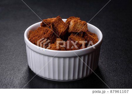 Breadcrumbs cut into cubes are perfect for soup, salad Breadcrumbs cut into cubes are perfect for soup, salad 87961107