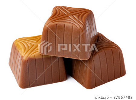 Chocolate sweets on a white background Chocolate sweets on a white background 87967488