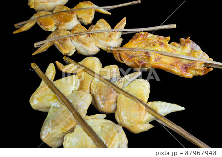 Die cut of Skewer Raw chicken on black isolated 87967948