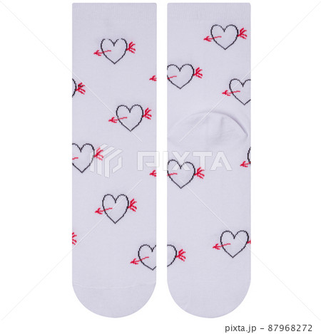 a pair of white socks with a pattern of hearts, one lies with the front part, the other with the heel forward, on a white background 87968272