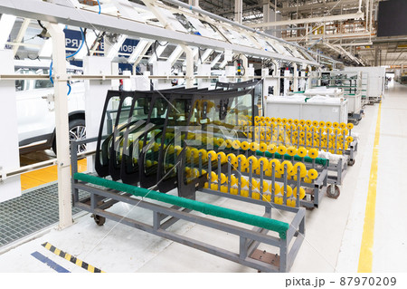 Photo of automobile production line. Welding car body. Modern car assembly plant. Auto industry 87970209