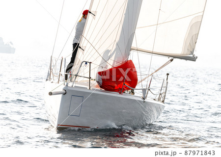Racing keelboat during regatta competition 87971843