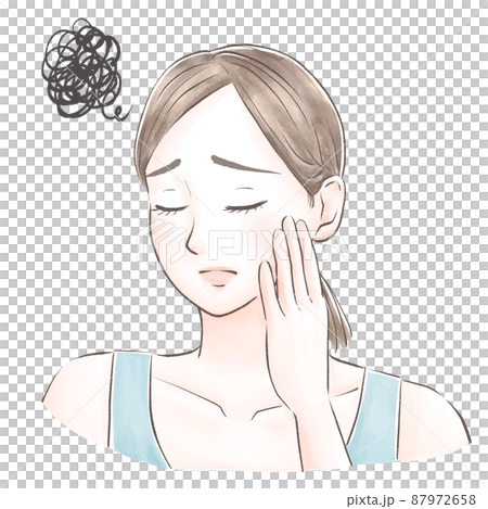 A woman who puts her hands on her cheeks, closes her eyes, and suffers from skin problems. 87972658