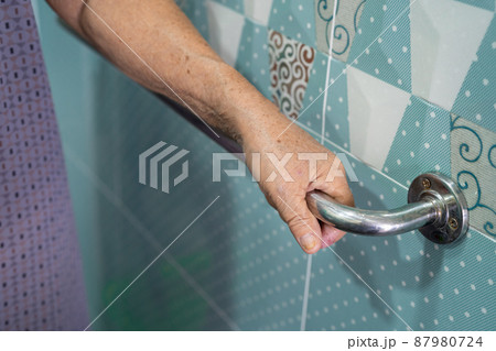 Asian senior or elderly old lady woman patient use toilet bathroom handle security in nursing hospital ward, healthy strong medical concept. 87980724