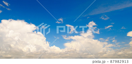 Blue sky with beautiful white clouds. Wide photo. Blue sky with beautiful white clouds. Wide photo. 87982913
