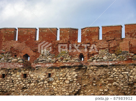 Fortress wall of the Novgorod Kremlin or Detinets is the fortress of Veliky Novgorod. 87983912