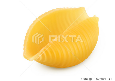 Uncooked dried conchiglie. Raw organic shell pasta isolated on white bachground with clipping path and full depth of field 87984131