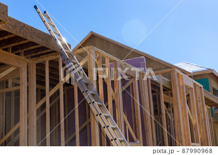 Framing beam of new house under construction home framing 87990968
