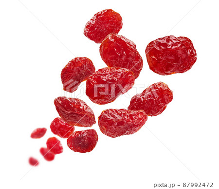 Dried dogwood berries levitate on a white background Dried dogwood berries levitate on a white background 87992472