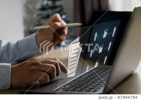 Businessman working reading documents graph financial to job succes Analyze online documentation database Document Management System (DMS) Businessman working reading documents graph financial to job succes Analyze online documentation database Document Management System (DMS) 87994794