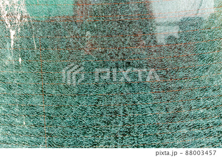 Broken tempered glass background.  88003457