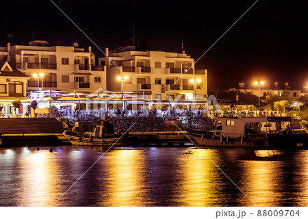 Traditional Greek fish restaurant at Zygi village at night. Larnaca District, Cyprus 88009704