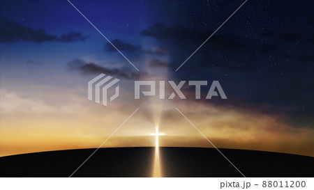 Bright cross on the hill with clouds moving on the starry sky Bright cross on the hill with clouds moving on the starry sky 88011200