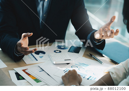 Group of IT consultant working by digital tablet and management big data and analyze financial document of company. 88012100