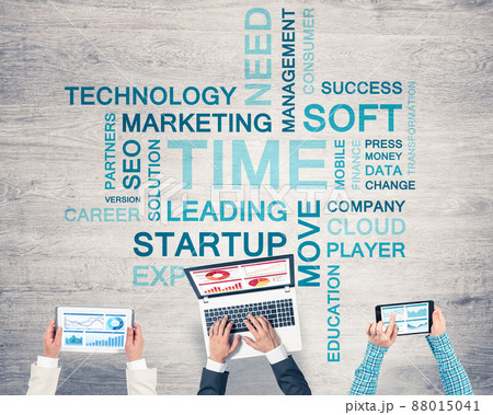 Top view of businesspeople sitting at table and using gadgets 88015041