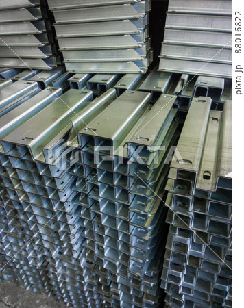 full frame view on stacks of profile bent sheet metal parts 88016822