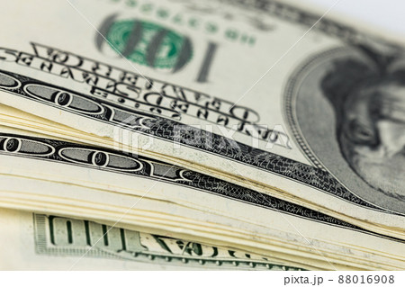 a skewed stack of old us dollar banknotes - close shot 88016908