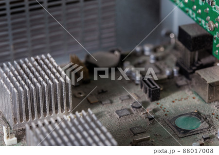 dusty pc electronic hardware closeup with selective focus and blur 88017008