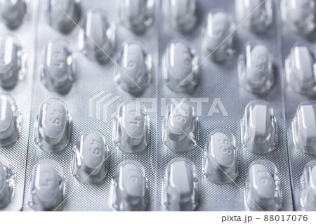 white tablets in blister closeup with selective focus white tablets in blister closeup with selective focus 88017076