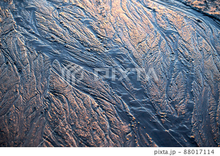 abstract mud background with water washout trails and selective focus 88017114