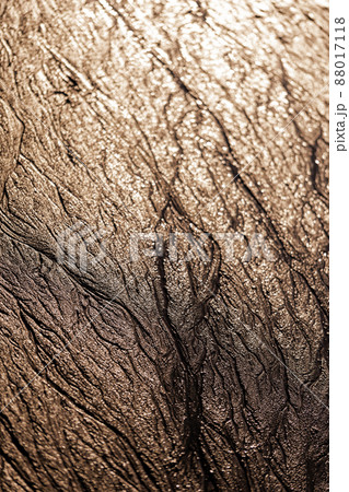 abstract mud background with water washout trails and selective focus 88017118